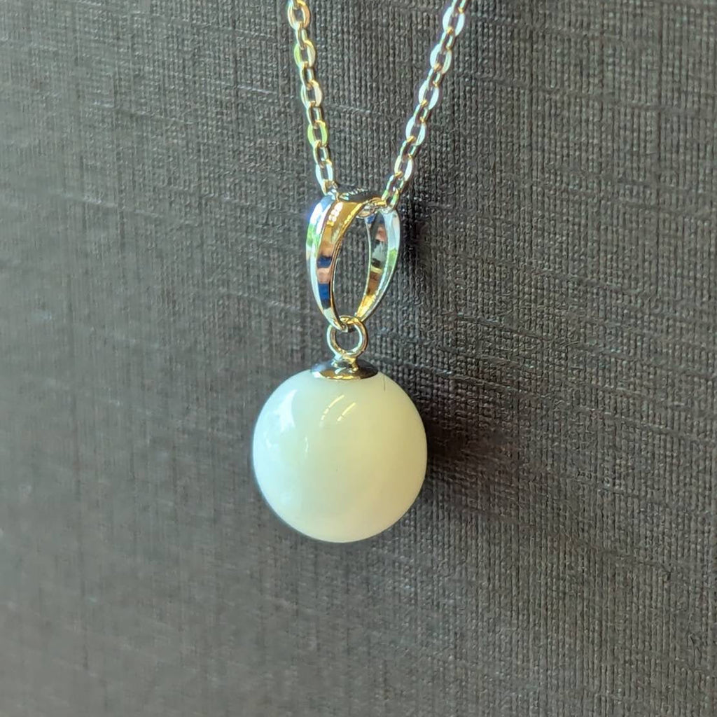 Platinum/K18 Memory Drop ( pearl-shaped) necklace top
