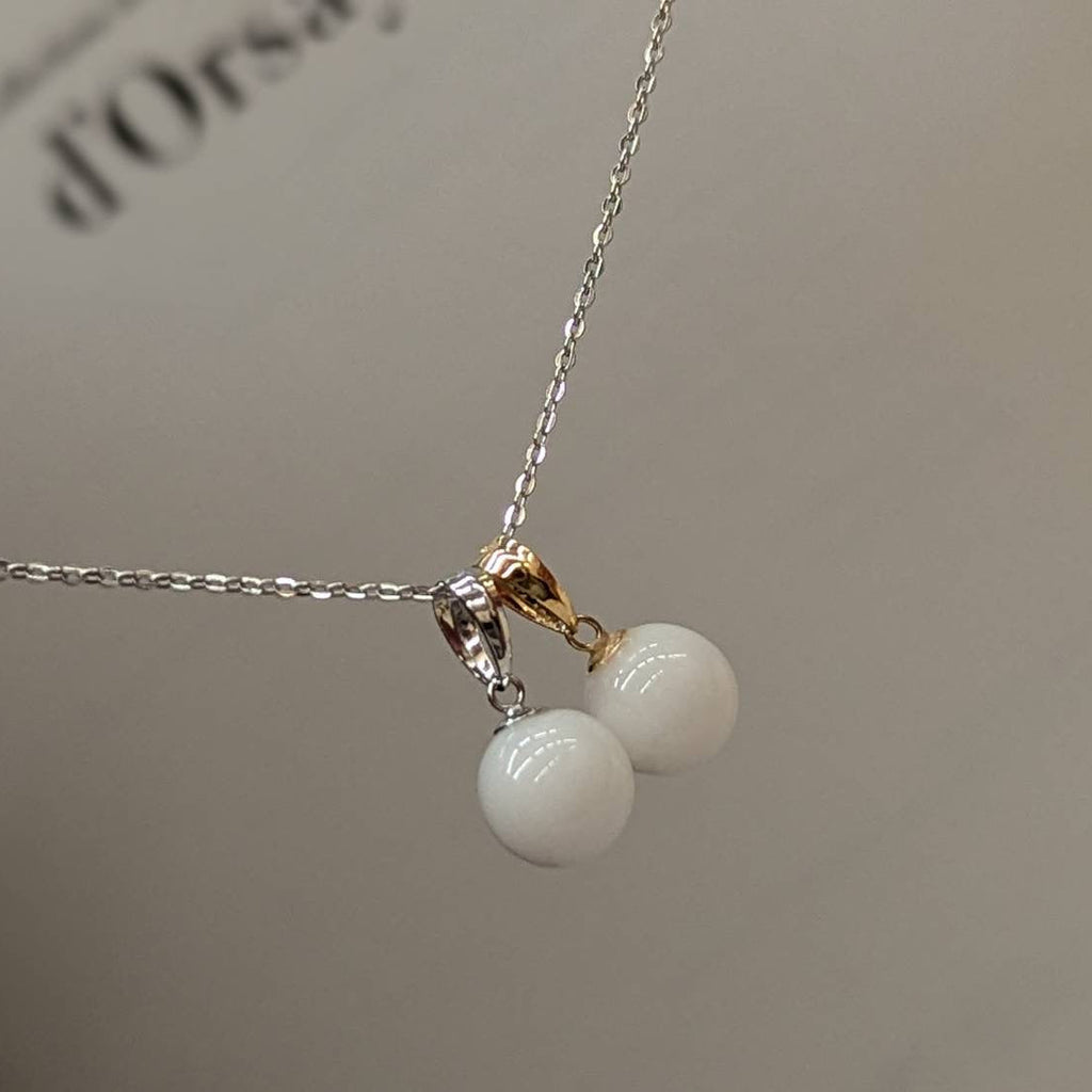 Platinum/K18 Memory Drop ( pearl-shaped) necklace top