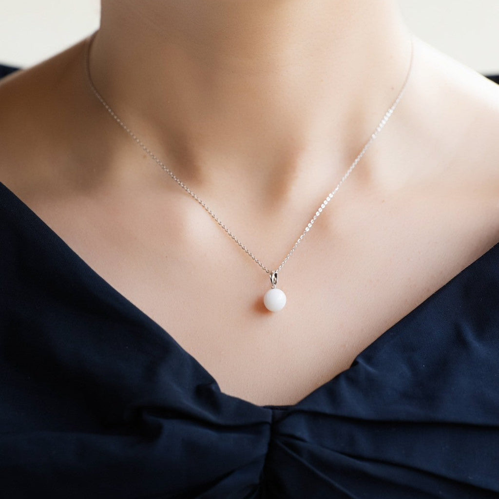 Platinum/K18 Memory Drop ( pearl-shaped) necklace top